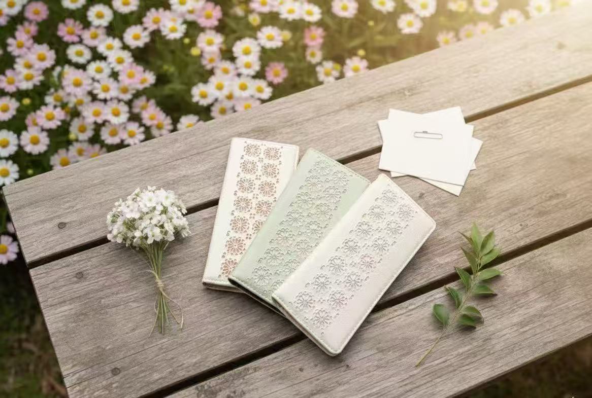 Floral cut‑out leather case with elegant layered detailing, Contrasting color floral pattern showing refined craftsmanship, Phone case in foldable stand mode for hands‑free viewing, Interior card slots for essential daily card storage, Slim wallet‑style l